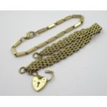 9ct Gold bracelet with padlock clasp, together with a 9ct gold rectangular link bracelet, 39g