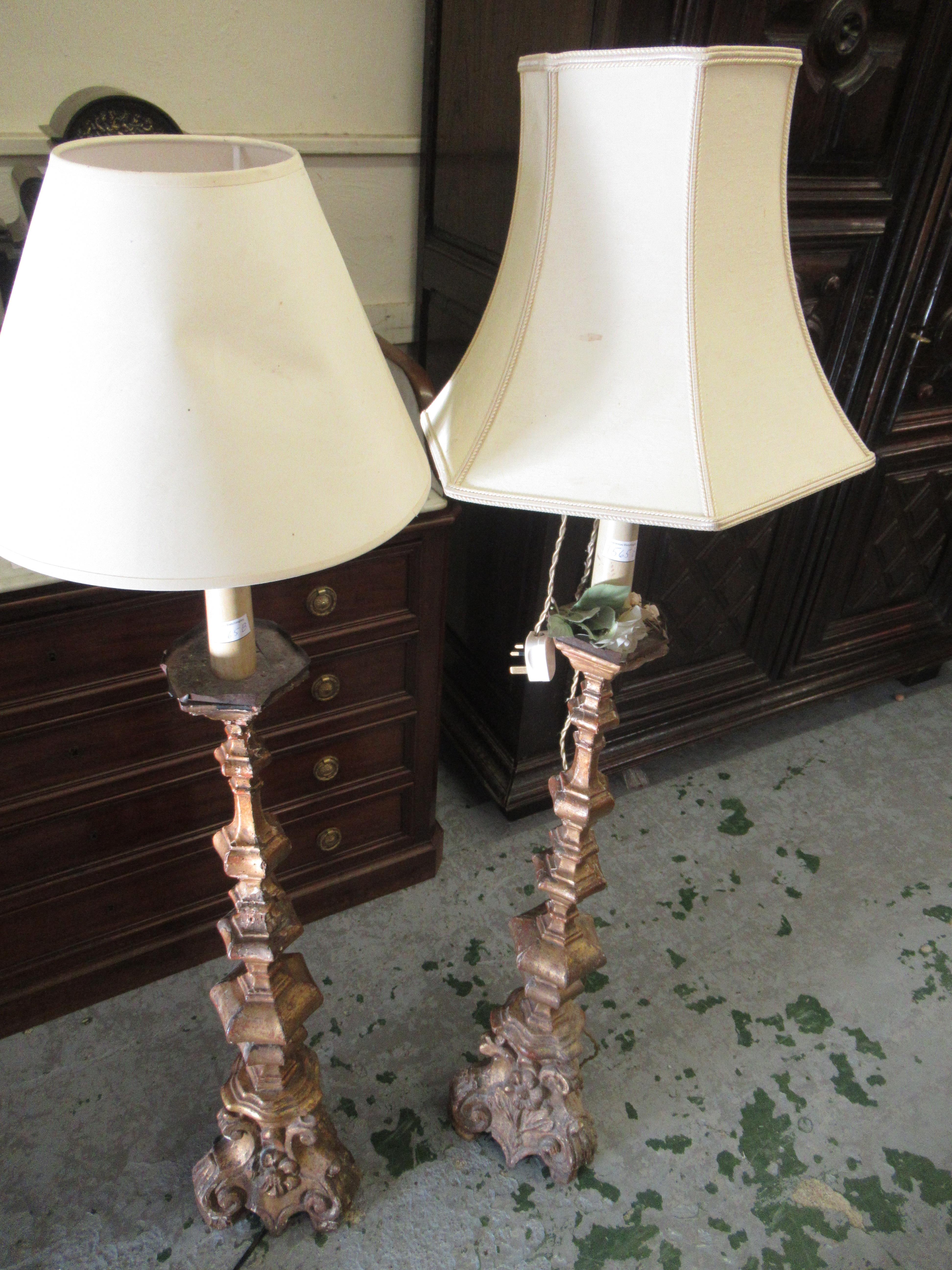 Pair of 17th / 18th Century Continental carved and giltwood candle stands, the tapering hexagonal