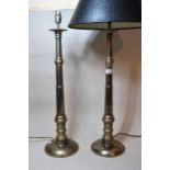 Pair of modern brushed steel turned column table lamps, 72cms high