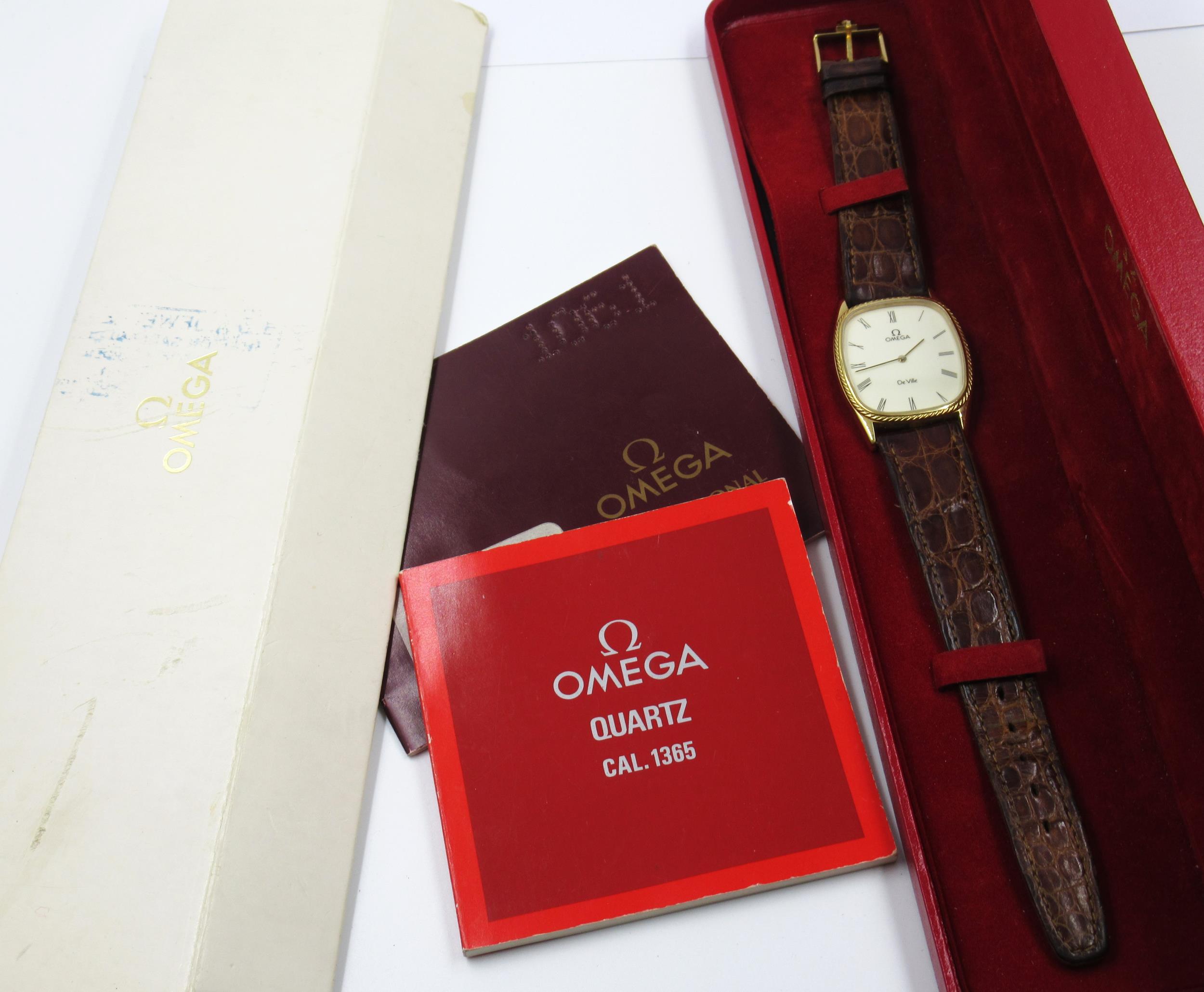 Omega De Ville ladies gold plated quartz wristwatch with brown leather strap, in original box with