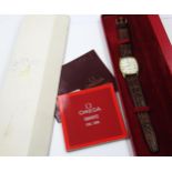 Omega De Ville ladies gold plated quartz wristwatch with brown leather strap, in original box with