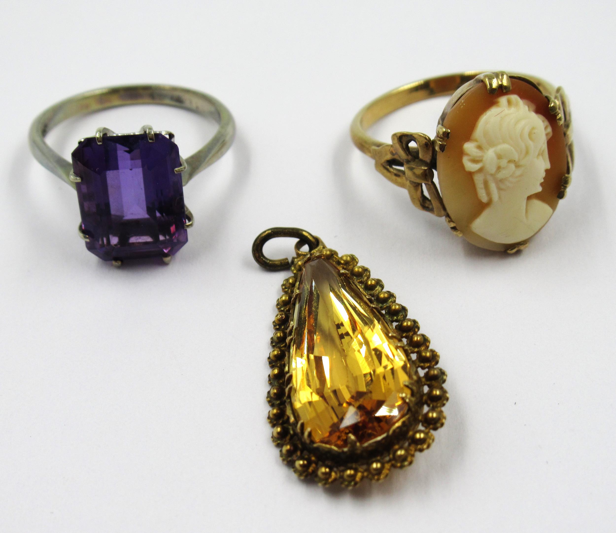 9ct Yellow gold shell carved cameo set ring, 9ct white gold baguette cut amethyst ring, and a yellow