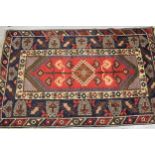 Modern Turkish rug with hooked medallion and tree of life design in shades of red, blue and cream,