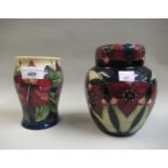 Moorcroft seconds vase by Philip Gibson, together with a ginger jar and cover with stylised floral