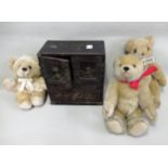 Small Steiff teddy bear, two other teddy bears and a small Japanese table cabinet