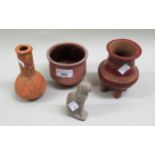 Three various small terracotta vases, possibly African, the tallest 13cms together with a small