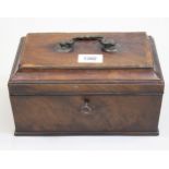 George III mahogany three division tea caddy, the hinged cover enclosing three lidded boxes,