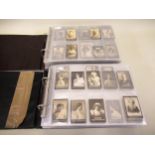 Two albums containing many hundreds of Ogden, early photographic Guinea Gold and Tabs cigarette