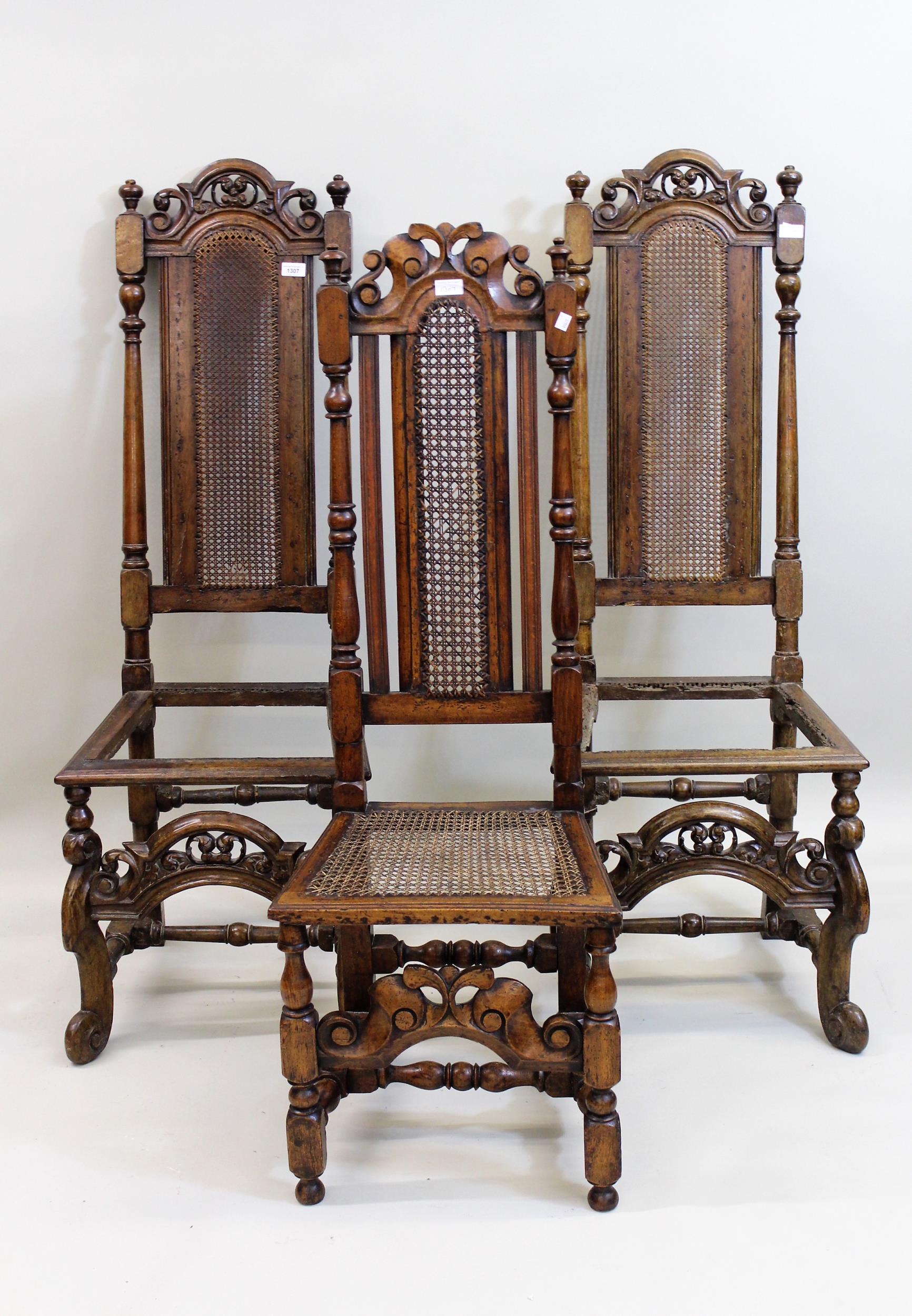 Pair of Carolean (late 17th Century) walnut side chairs, the high cane inset backs with pierced