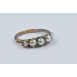 Gold half hoop ring set five split pearls, interspaced with diamond chips, size 'N'