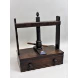 19th Century elm and mahogany book press with a single drawer and turned knob handle, 63cms wide