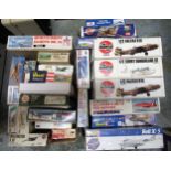 Two boxes containing a large collection of various unbuilt model aircraft kits, including Airfix,