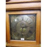 Oak longcase clock, the architectural hood with flanking pilasters above a rectangular panel door