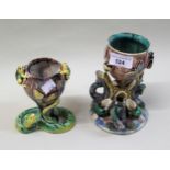 Two Portuguese Palissy style vases, with fish and serpent to the bases, 17cms and 14cms high