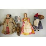 Box containing a quantity of dolls, including an articulated figure of a monkey (at fault) and a