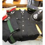 Intelligence Corps suit jacket and hat, two military peaked hats and a policeman's helmet