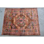 Bastan carpet with a medallion and stylised floral design on a fawn ground, in shades of rose, blue,