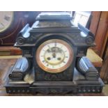 19th Century black slate mantel clock, the shaped case having circular enamel dial with visible