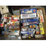 Two boxes containing a collection of various unbuilt model aircraft kits including, Revel, Matchbox,