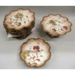Limoges floral and gilt decorated blush ivory dessert service comprising: comport, dish and twelve