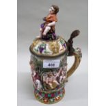 Cape De Monte porcelain lidded mug, decorated with bacchanalian scene, the cover mounted with a