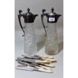 Pair of cut glass claret jugs with silver plated covers, together with a set of six silver plated