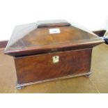 19th Century mahogany sarcophagus shaped tea caddy, the hinged covering enclosing a three division