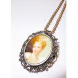 Oval silver portrait pendant / brooch on chain
