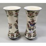 Pair of Zsolnay tall flared rim vases, decorated with birds and flowers, 33cms high
