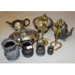Graduated set of four pewter measures, pewter teapot and a pair of brass cobra candlesticks,