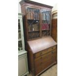 19th Century mahogany bureau bookcase, having moulded cornice with astragal glazed doors, the fall