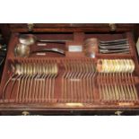 Oak cased two drawer canteen cabinet housing a twelve place setting canteen of cutlery (at fault)