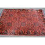 Afghan Belouch rug with two rows of three gols on wine ground with borders, 193cms x 125cms