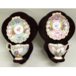 Pair of 19th Century Dresden cabinet cups and saucers on wall mounting display stand, (with damages)