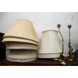 Pair of giltwood and brass table lamp mounts together with a quantity of various lamp shades