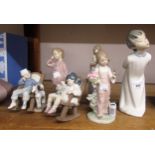 Collection of six various Lladro and Nao figures Figure of girl with a bird on her hand - some minor