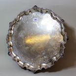 Large Sheffield silver presentation salver, with cast shaped rim and engraved border on low shaped