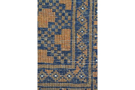 Afghan gold ground carpet with three rows of eight gols within a multiple border, 290cms x 210cms - Image 7 of 8