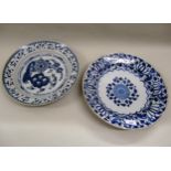 18th / 19th Century Dutch Delft circular deep dish decorated in blue and white with an oriental