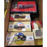 Box containing a collection of Corgi Classics model tankers and haulage vehicles, including