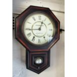 Small early 20th Century ebonised and line painted octagonal drop dial wall clock by Seth Thomas,