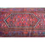 Hamadan rug of all-over floral geometric design with multiple borders on a wine red ground, 218cms x