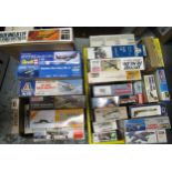 Two boxes containing a collection of various unbuilt model aircraft kits, including Revel, Matchbox,