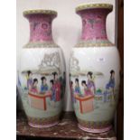 Pair of large 20th Century porcelain baluster form vases decorated with figures, signed with red