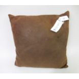 Gucci, brown leather cushion, with original price ticket Some scuffs, stains and marks to the