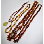 Three Baltic amber necklaces together with a beadwork pendant