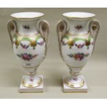 Pair of good quality late Dresden two handled pedestal vases with floral and gilt decoration,