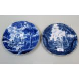 18th Century Delft blue and white plate decorated with figures in a landscape beneath the initials P