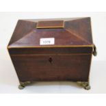 Regency mahogany line inlaid and brass mounted sarcophagus shaped tea caddy, the hinged cover