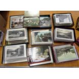 Six small boxes containing a collection of Lake District related postcards, together with three
